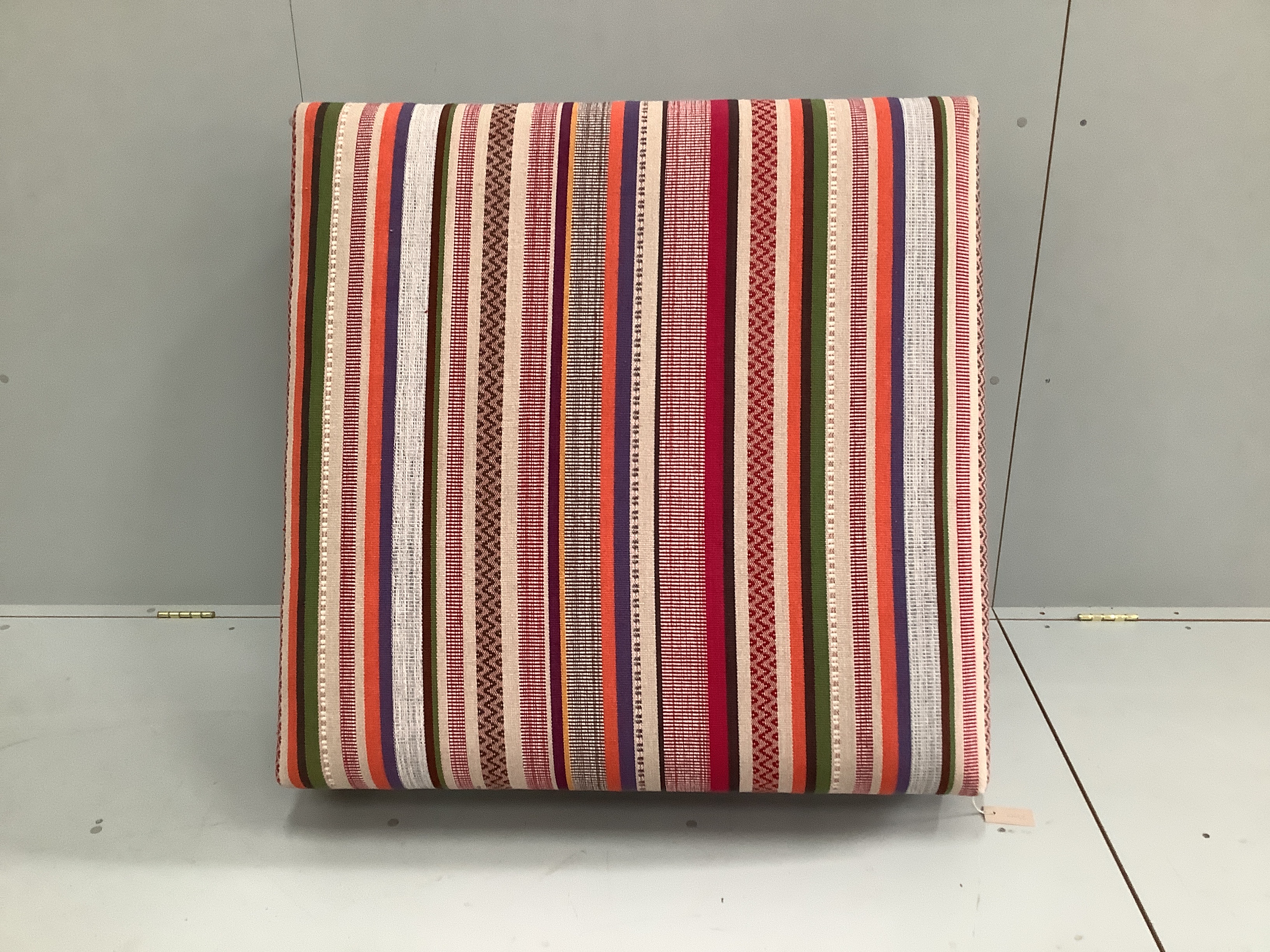 A large contemporary square footstool upholstered in Jane Churchill Cabrera Stripe, width 98cm, height 30cm